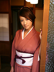Sexy gravure idol beauty slowly takes off her pink kimono