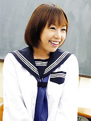 Schoolgirl Norika touching her smooth hole