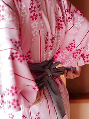 As Uri lifts up her Japanese Yukata, her silky white panties and wide hips are exposed. The thong is so thin it can't cover the creases of her booty hole.