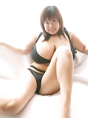 Sexy Fuko posing in a black bikini her monster tits