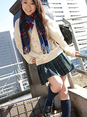Tomoyo Hoshino Asian in short skirt goes to a walk in the city