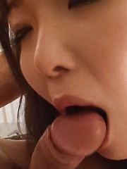 Haruka Oosawa Asian sucks phallus and rubs it between her labia