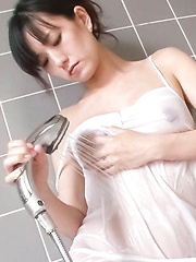 Manami Komukai Asian has orgasms and gives blowjob at shower