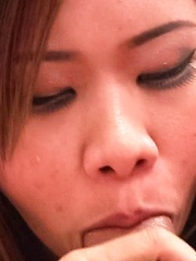 Eve Asian nymphet rubs her cunt with long nails and sucks shlong