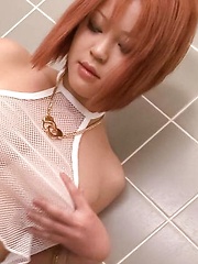 SARA Asian doll teases her boobs with shower over fishnet blouse