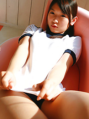 Noriko Kijima Asian in sports equipment is playful in the house