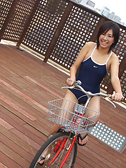 Ageha Yagyu Asian in spandex bath suit shows curves on bike
