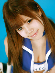 Asuka Nakano Asian with nasty smile poses in very short skirt
