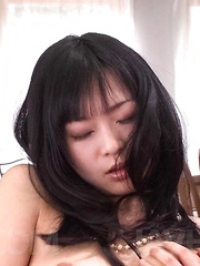 Nozomi Hatsuki Asian fucks slit with fingers and uses vibrator