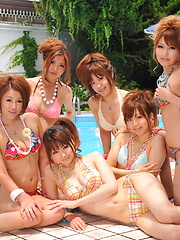 Sexy Japanese honeys pose in tiny bikinis