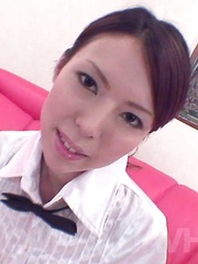 Rino Asuka Asian in office outfit rubs dick with hands and feet