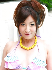 Stunning Japanese porn queen by the pool