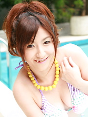 Stunning Japanese porn queen by the pool
