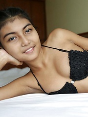 Petite Thai teen with amazing perfect body sucks white dick